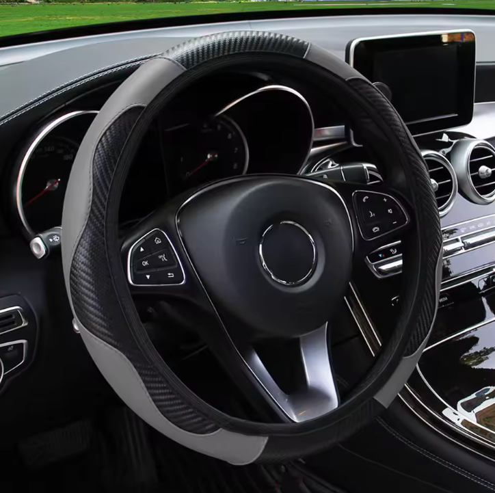 PROTECTOR DE VOLANTE DE FIBRA DE CARBONO (AUTOSHIELD™)